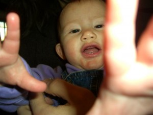 Josie and her tooth (and hands)