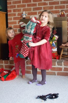 Celia and Josie holding their stockings