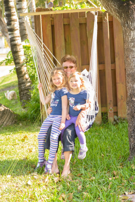 Abuela and the girls in the swing